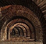 Carta da parati Bricks Passage Trompe l'oeil